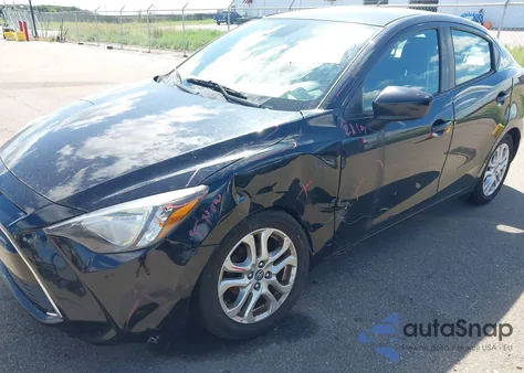 2017 Toyota Yaris Ia из США, поврежденный, VIN 3MYDLBYV9HY148817